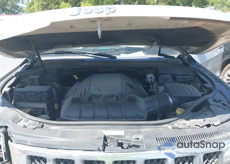 2012 Jeep Grand Cherokee Overland из США, поврежденный, VIN 1C4RJECT6CC209852